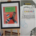 Oprawiony plakat z kolorowymi skarpetkami i polskim tekstem na Światowy Dzień Zespołu Downa znajduje się po lewej stronie. Po prawej stronie znajduje się arkusz z rysunkami na temat projektowania skarpetek, długopis i częściowo kolorowy kontur skarpetki.