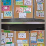 Kolorowe rysunki dzieci wyświetlane na tablicach ogłoszeń w korytarzu szkolnym.