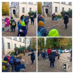 Dzieci grają w grę grupową na świeżym powietrzu ze sznurkami w pobliżu białego budynku w jesienny dzień.