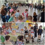 Dzieci przebrane za Pippi Pończoszankę świętują w szkolnej sali, bawiąc się i dekorując tort.