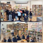 Grupa uczniów w bibliotece, oglądająca przedstawienie kukiełkowe.